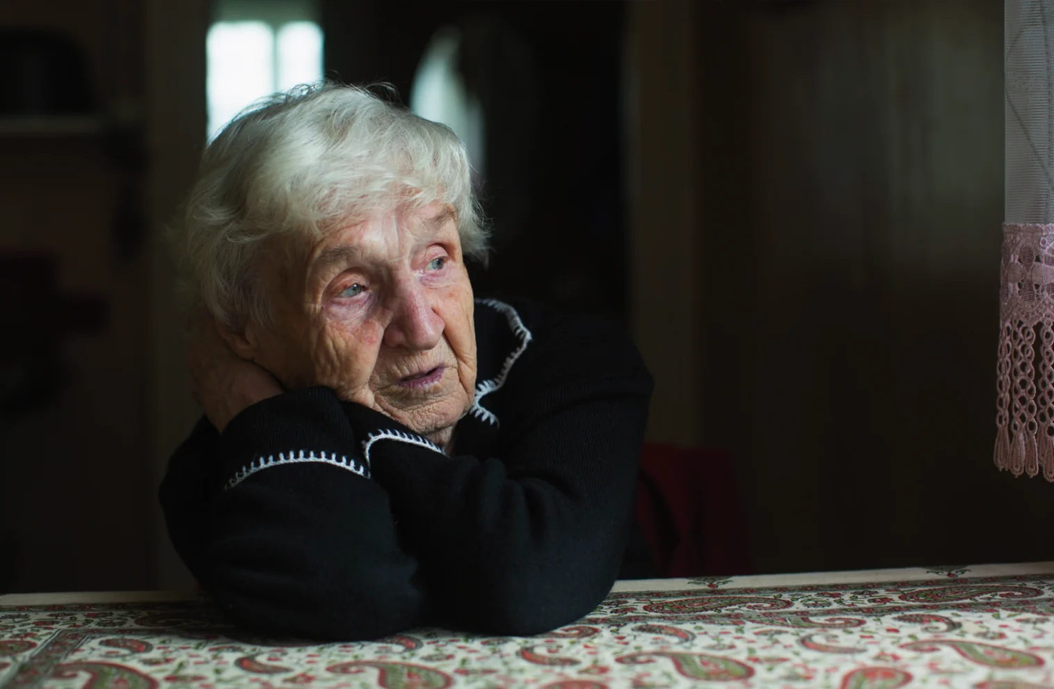 Older woman in quiet reflection