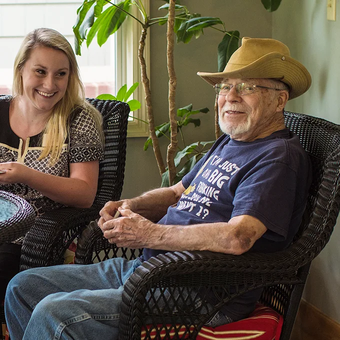 Allandale resident visiting with a care provider
